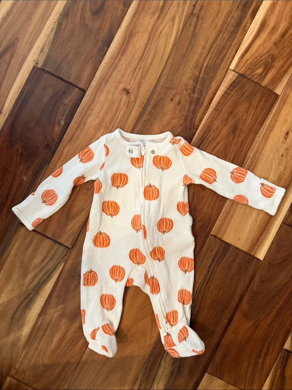 Carter's Cream Footed One-Piece with Orange Pumpkin Pattern